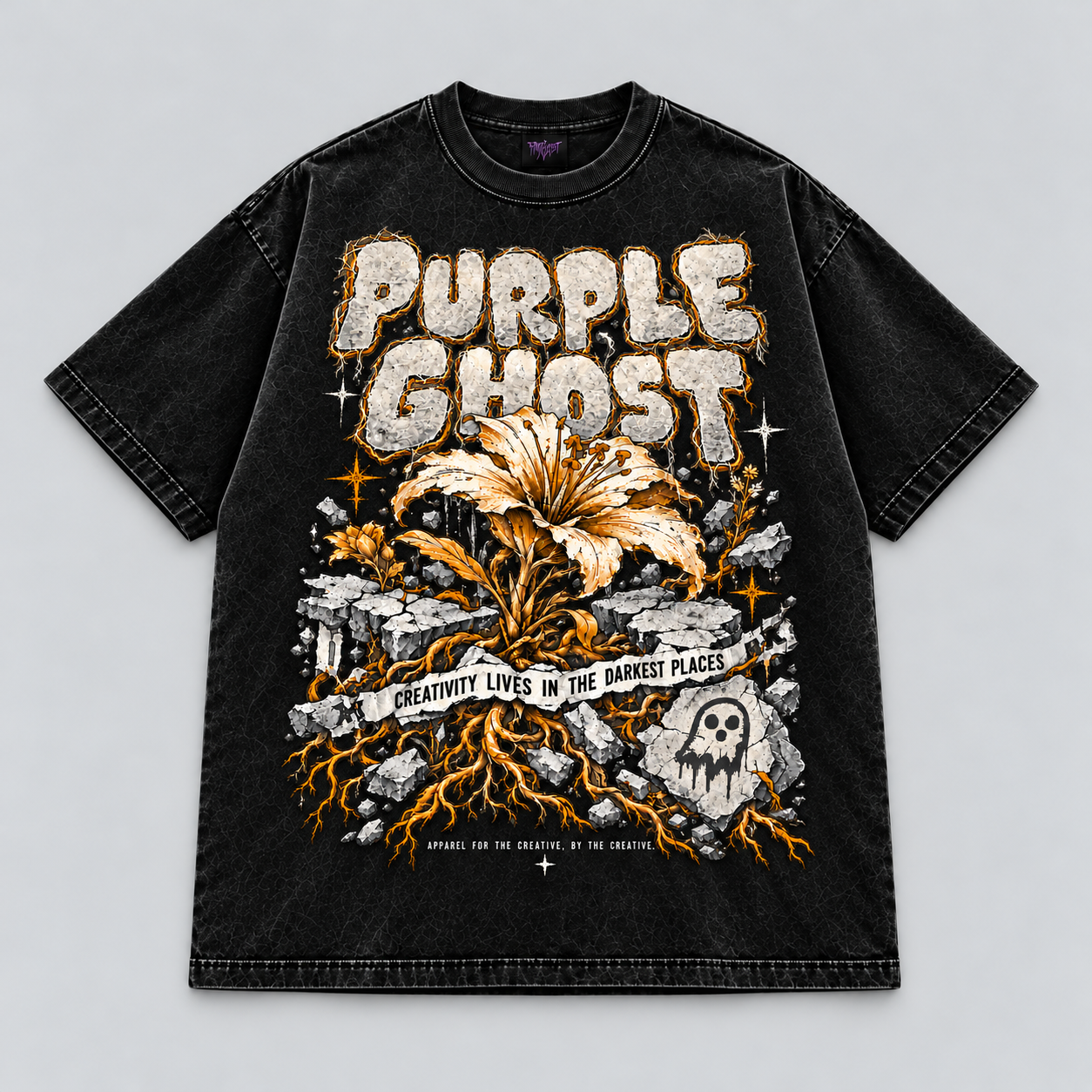 Creativity Breaks Through black oversized tee front mockup — antique gold flower, bone lettering and charcoal ghost